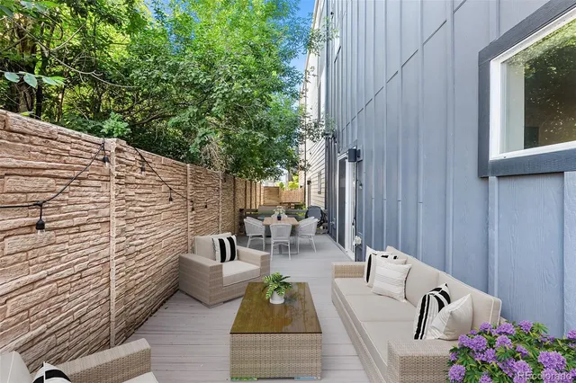 a view of balcony with couple of couch