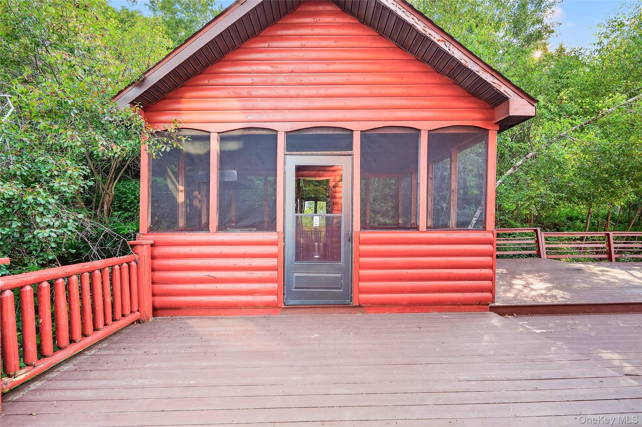 987 Hurd Road Jeffersonville, NY 12748 - Photo 15 of 50 a front view of a house with a garden