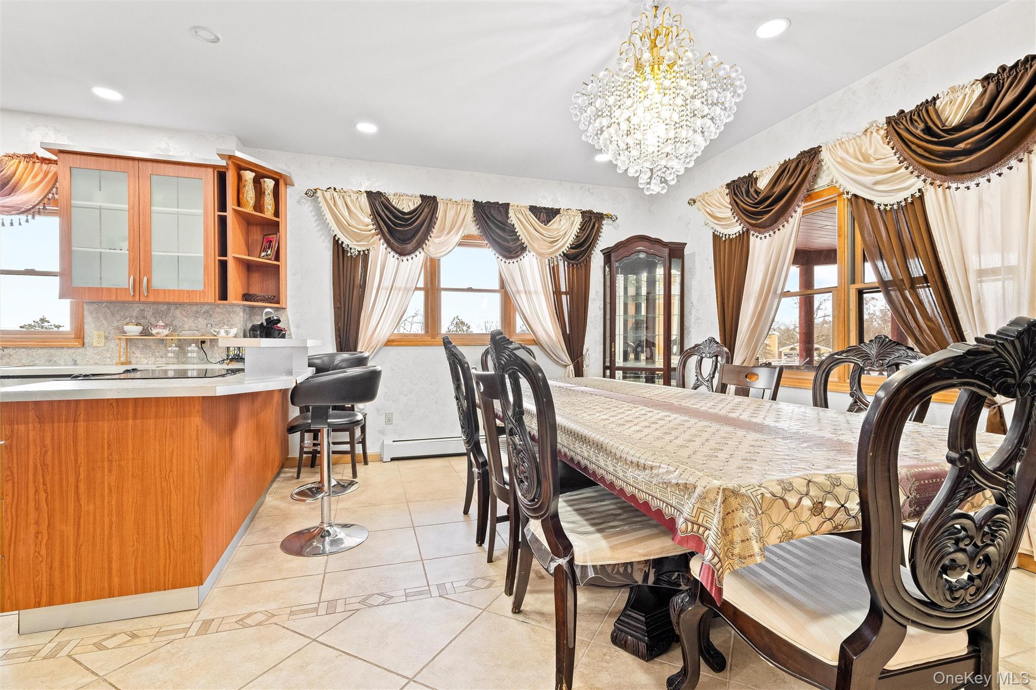 987 Hurd Road Jeffersonville, NY 12748 - Photo 27 of 50 a dining room filled with furniture and chandelier