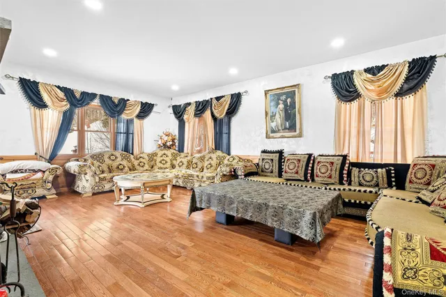 a room with furniture and air hockey table