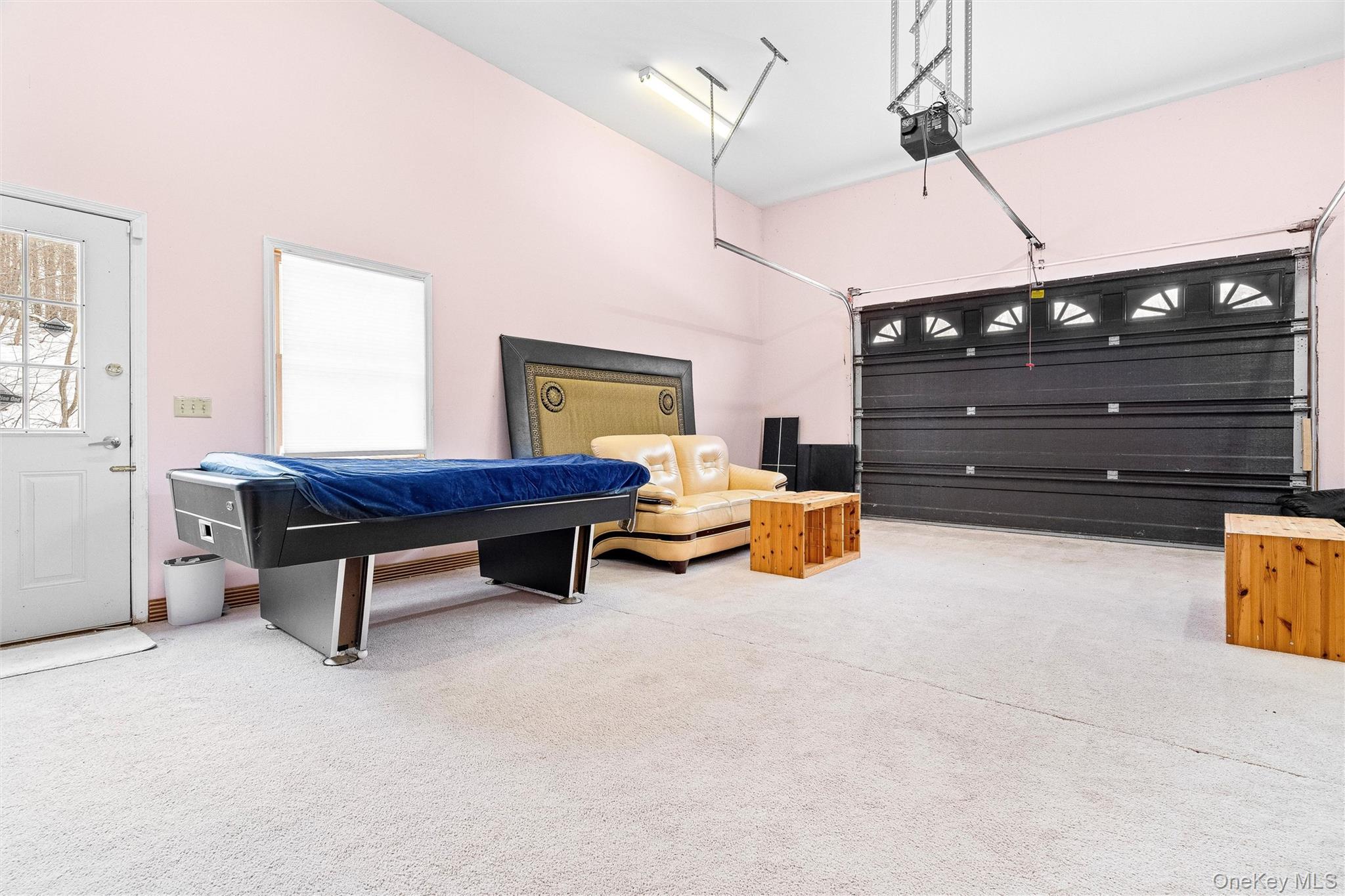 987 Hurd Road Jeffersonville, NY 12748 - Photo 32 of 50 a room with furniture and air hockey table