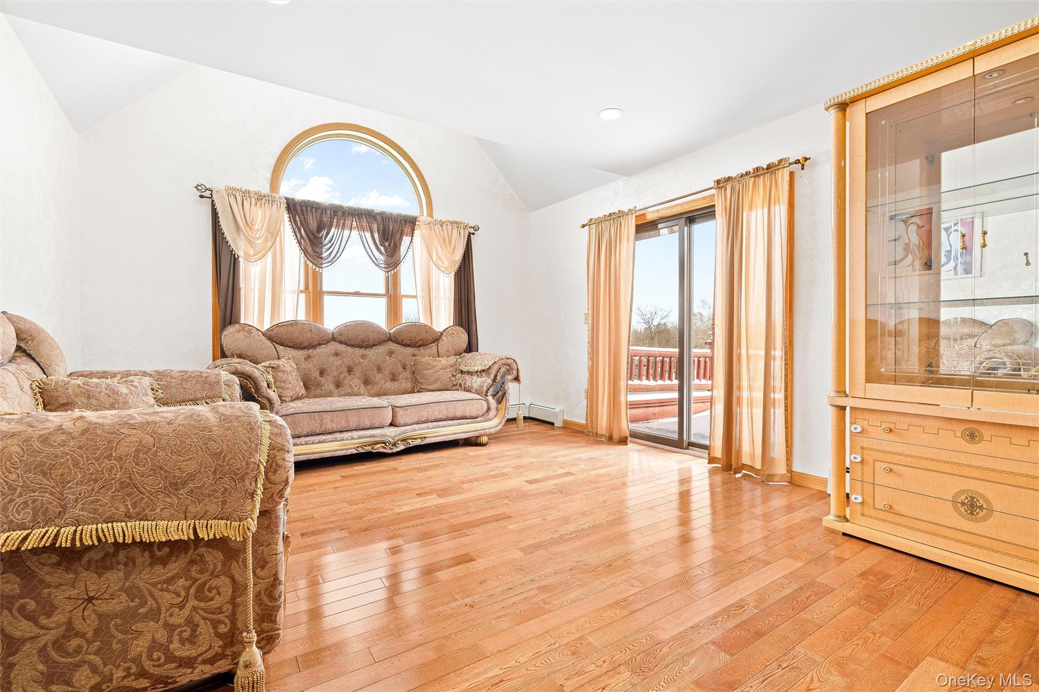 987 Hurd Road Jeffersonville, NY 12748 - Photo 37 of 50 a living room with furniture and a large window