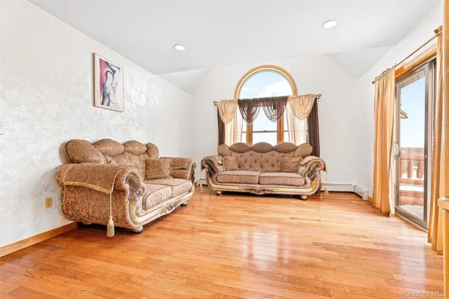 a bedroom with a bed and a fireplace