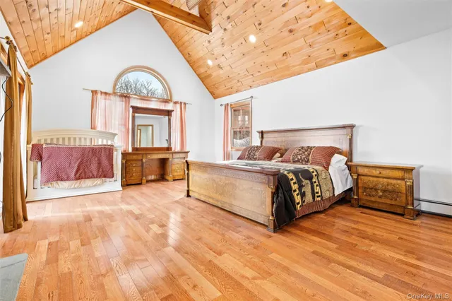 a bathroom with a tub and shower
