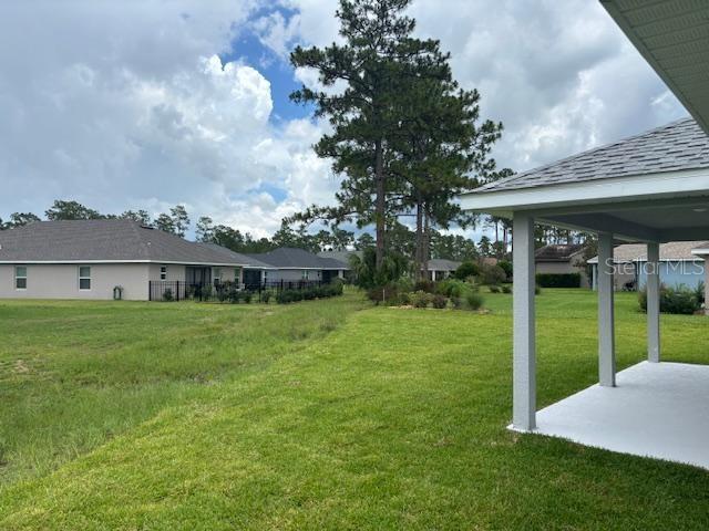 7781 Southwest 180th Circle Dunnellon, FL 34432 - Photo 12 of 20 a view of a yard in front of house