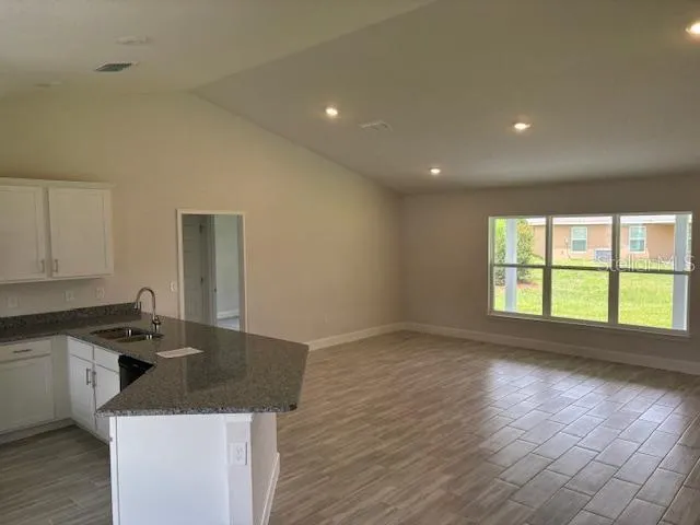 a house with a garden in front of it