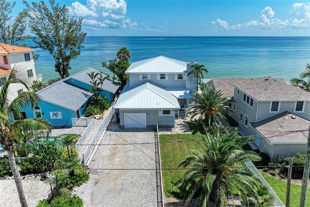 893 North Shore Drive Anna Maria, FL 34216 - Photo 2 of 62 an aerial view of a house with outdoor space