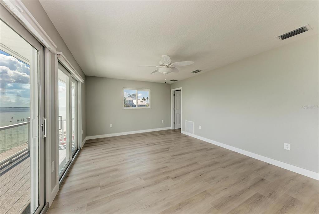 893 North Shore Drive Anna Maria, FL 34216 - Photo 38 of 62 a view of an empty room with a window