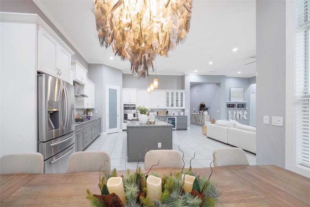 14006 Quarry Lake Road Lithia, FL 33547 - Photo 11 of 50 a living room with furniture and a chandelier