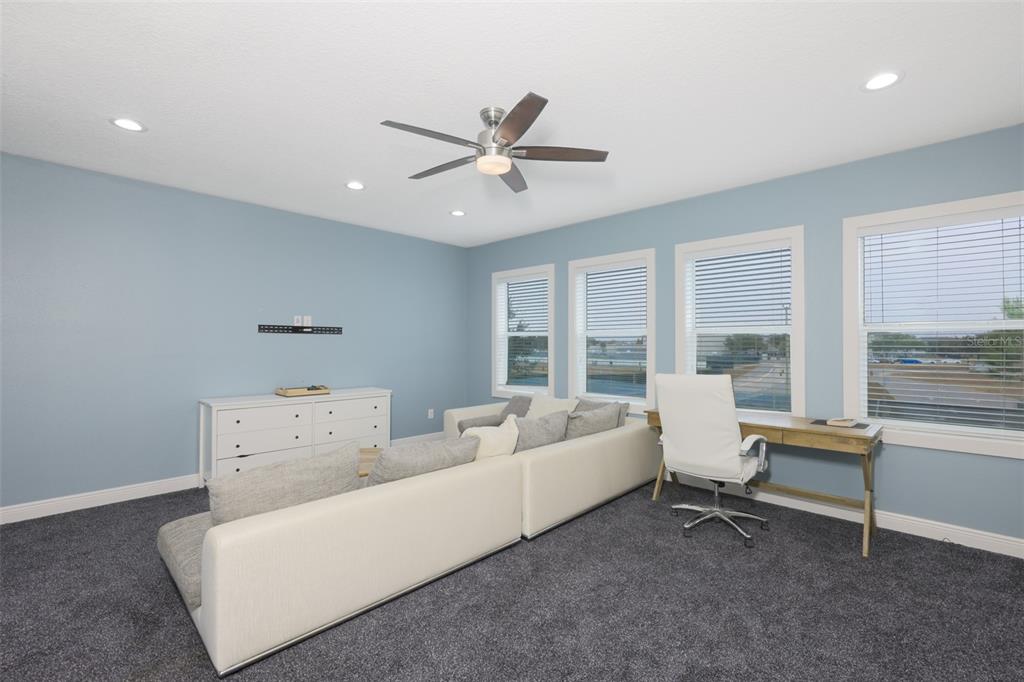 14006 Quarry Lake Road Lithia, FL 33547 - Photo 19 of 50 a living room with furniture and a large window