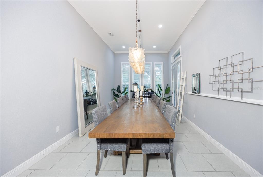 14006 Quarry Lake Road Lithia, FL 33547 - Photo 3 of 50 a dining room with furniture and wooden floor