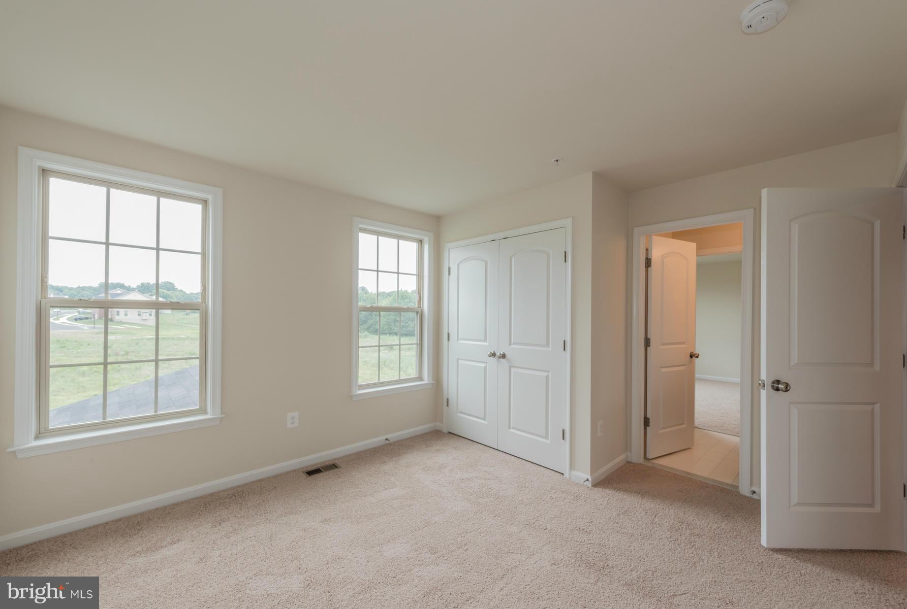 4336 Chapel Road Perry Hall, MD 21128 - Photo 25 of 30 an empty room with windows and closet