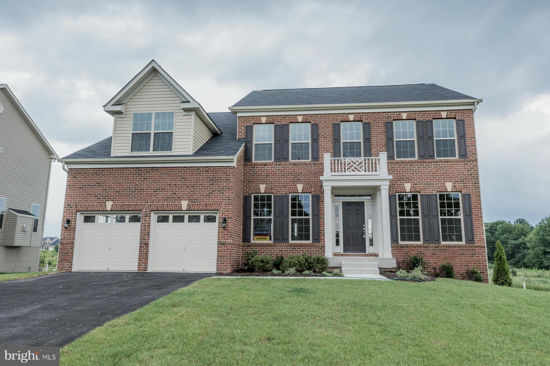 4336 Chapel Road Perry Hall, MD 21128 - Photo 28 of 30 a front view of a house with a garden