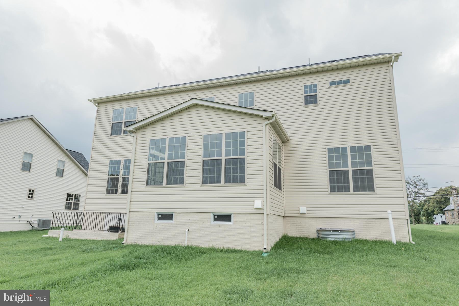 4336 Chapel Road Perry Hall, MD 21128 - Photo 29 of 30 front view of a house with a yard