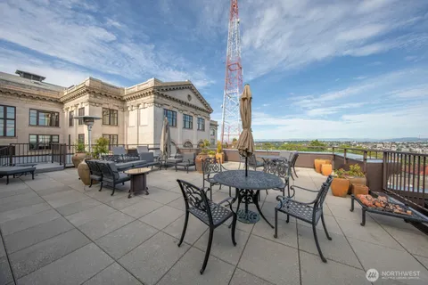 a view of a terrace with furniture