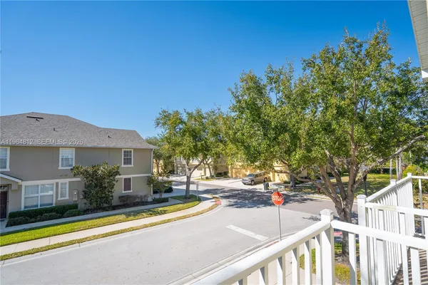 a view of a house with a swimming pool