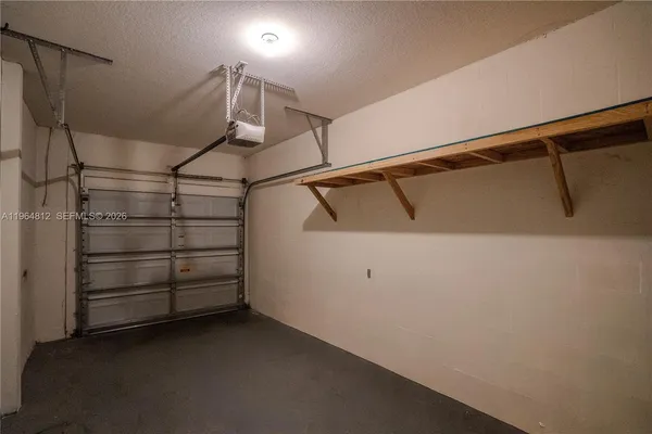 a view of a room with racks on the wall