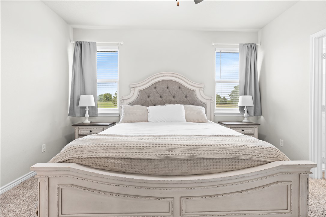 596 J W Martine Road Hearne, TX 77859 - Photo 14 of 36 a bedroom with a bed and a window