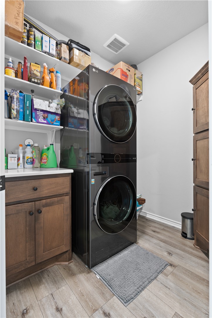 596 J W Martine Road Hearne, TX 77859 - Photo 26 of 36 a utility room with dryer and washer