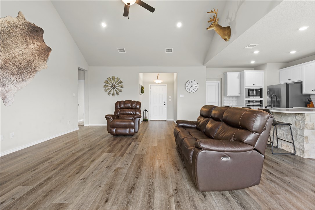 596 J W Martine Road Hearne, TX 77859 - Photo 5 of 36 a living room with furniture and a wooden floor