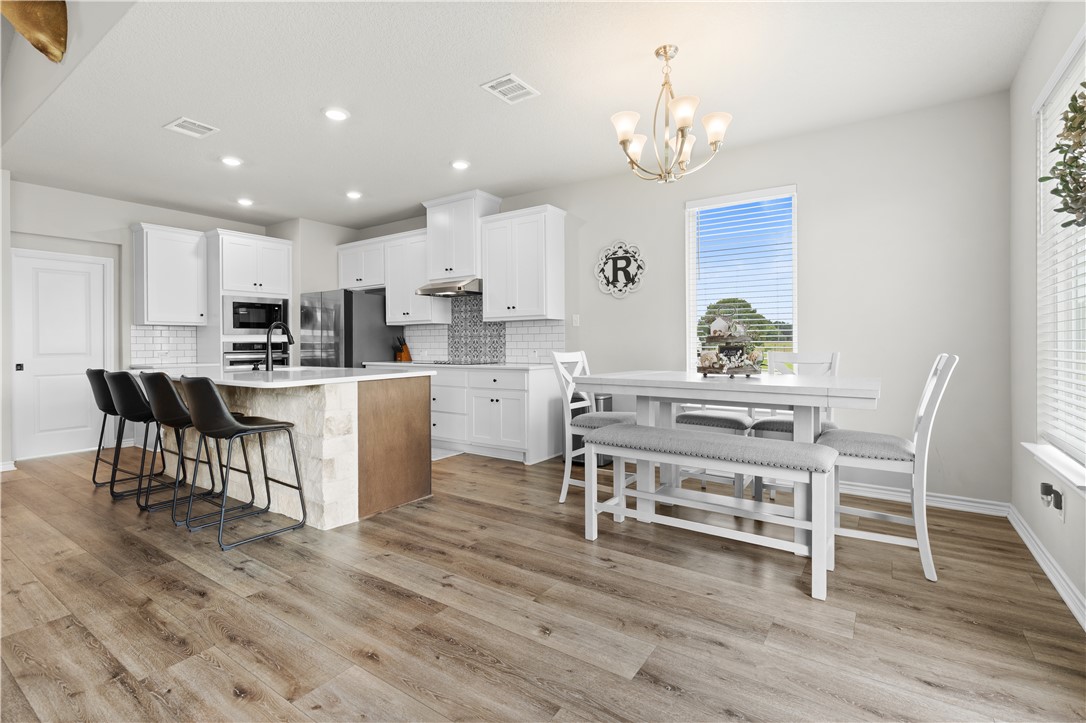 596 J W Martine Road Hearne, TX 77859 - Photo 7 of 36 a view of kitchen with dining table and chairs