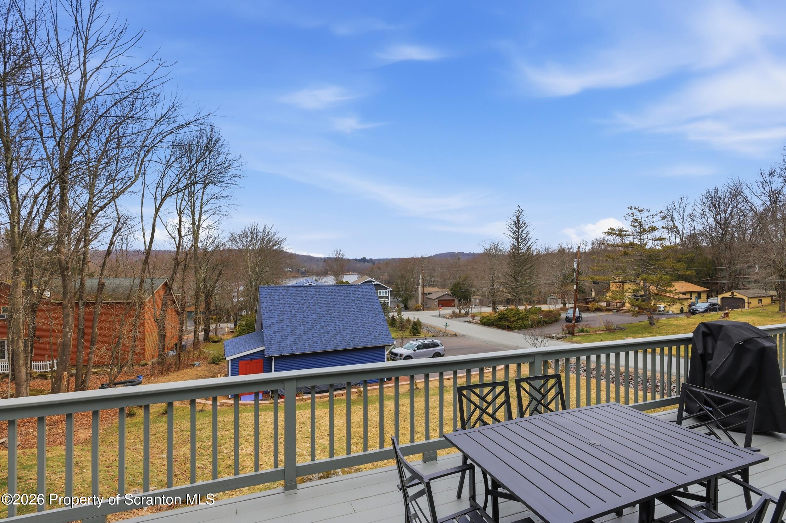 1647 Windmere Place Lake Ariel, PA 18436 - Photo 34 of 65 a view of a brick wall with a roof deck