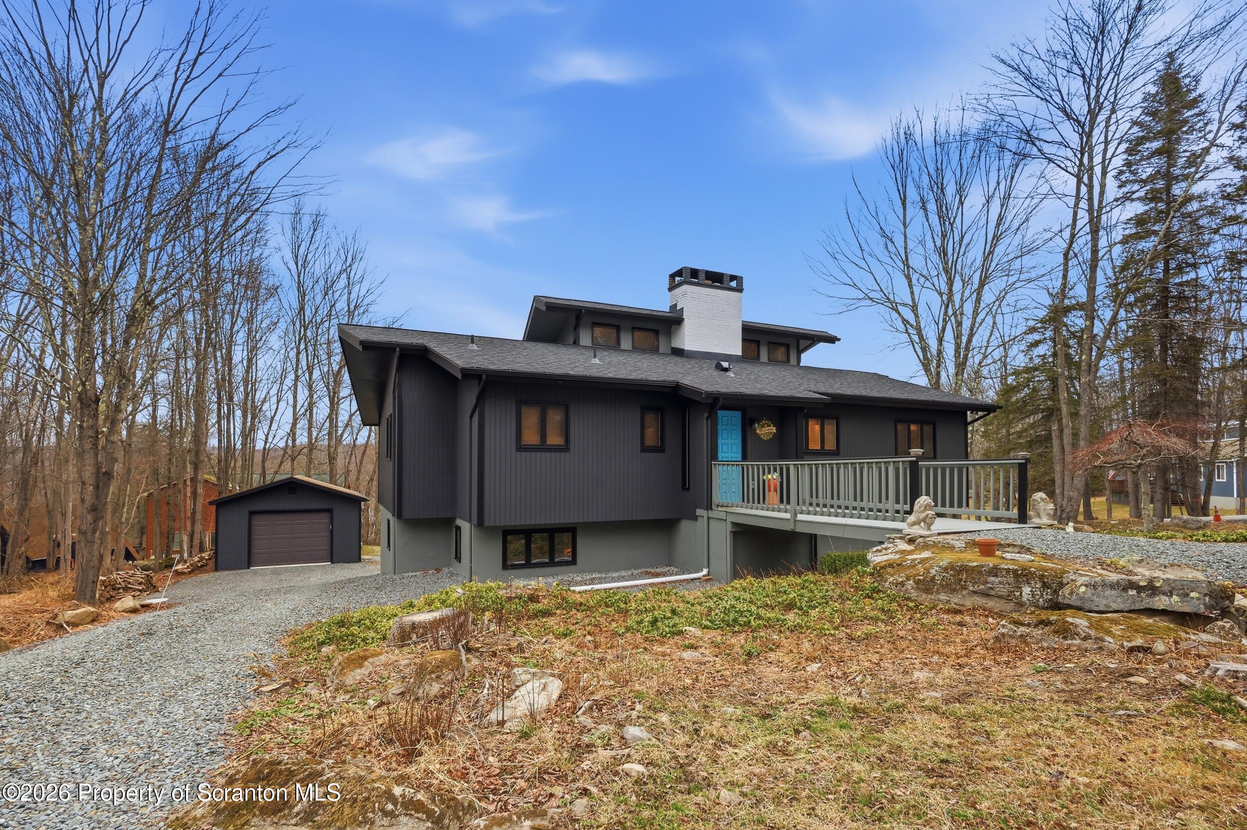 1647 Windmere Place Lake Ariel, PA 18436 - Photo 39 of 65 a house view with a snow in the yard