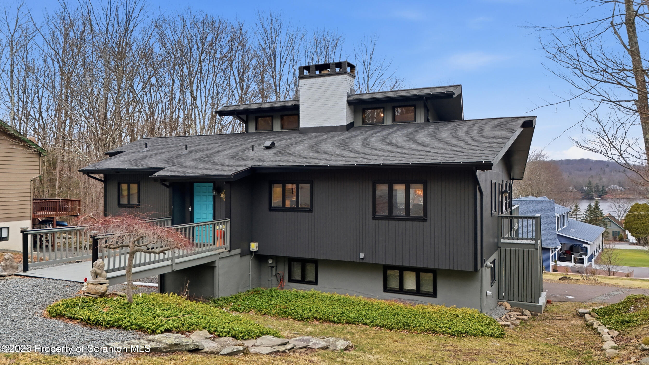 1647 Windmere Place Lake Ariel, PA 18436 - Photo 42 of 65 a front view of a house with garden
