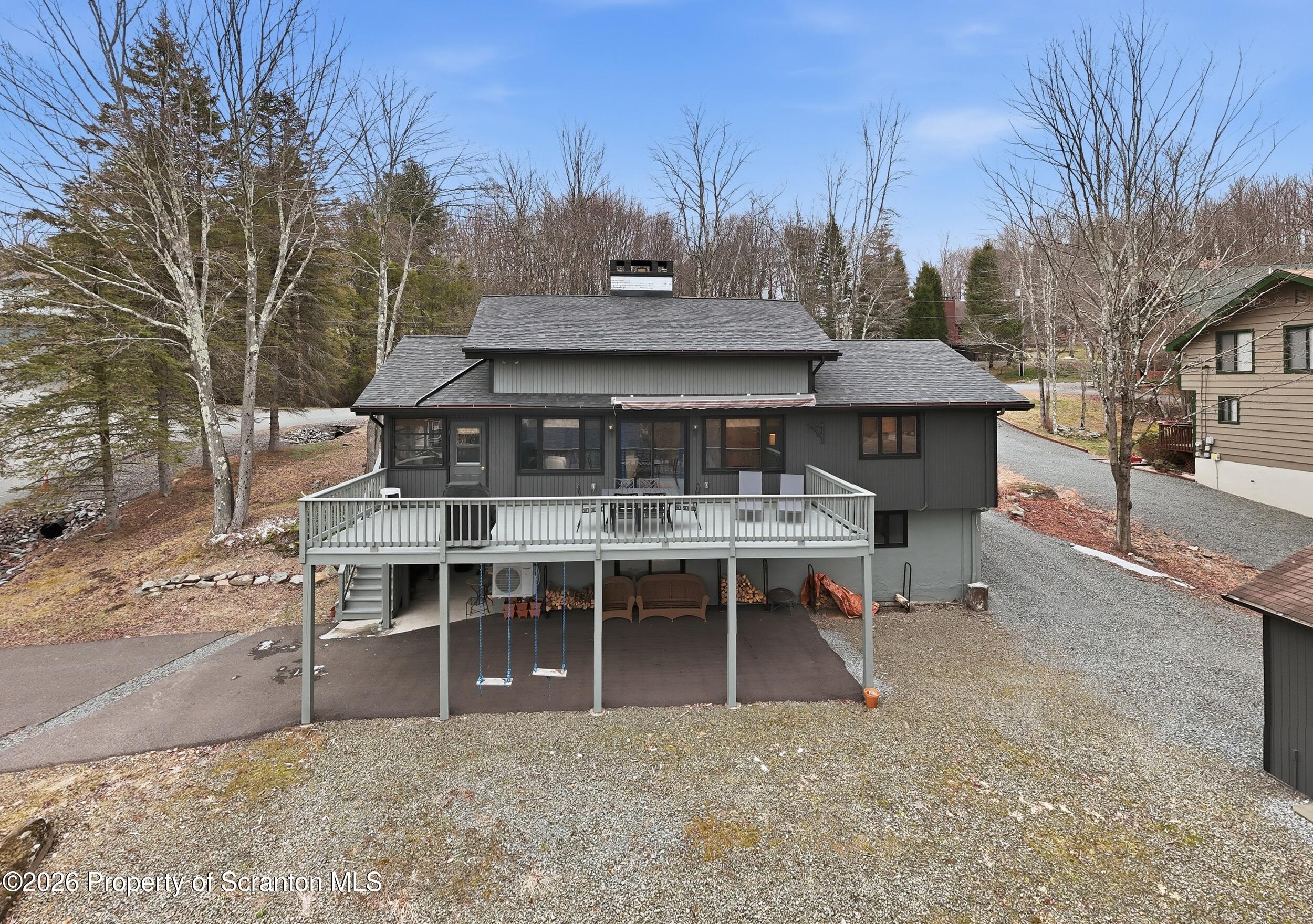 1647 Windmere Place Lake Ariel, PA 18436 - Photo 44 of 65 a view of a house with a table and chairs