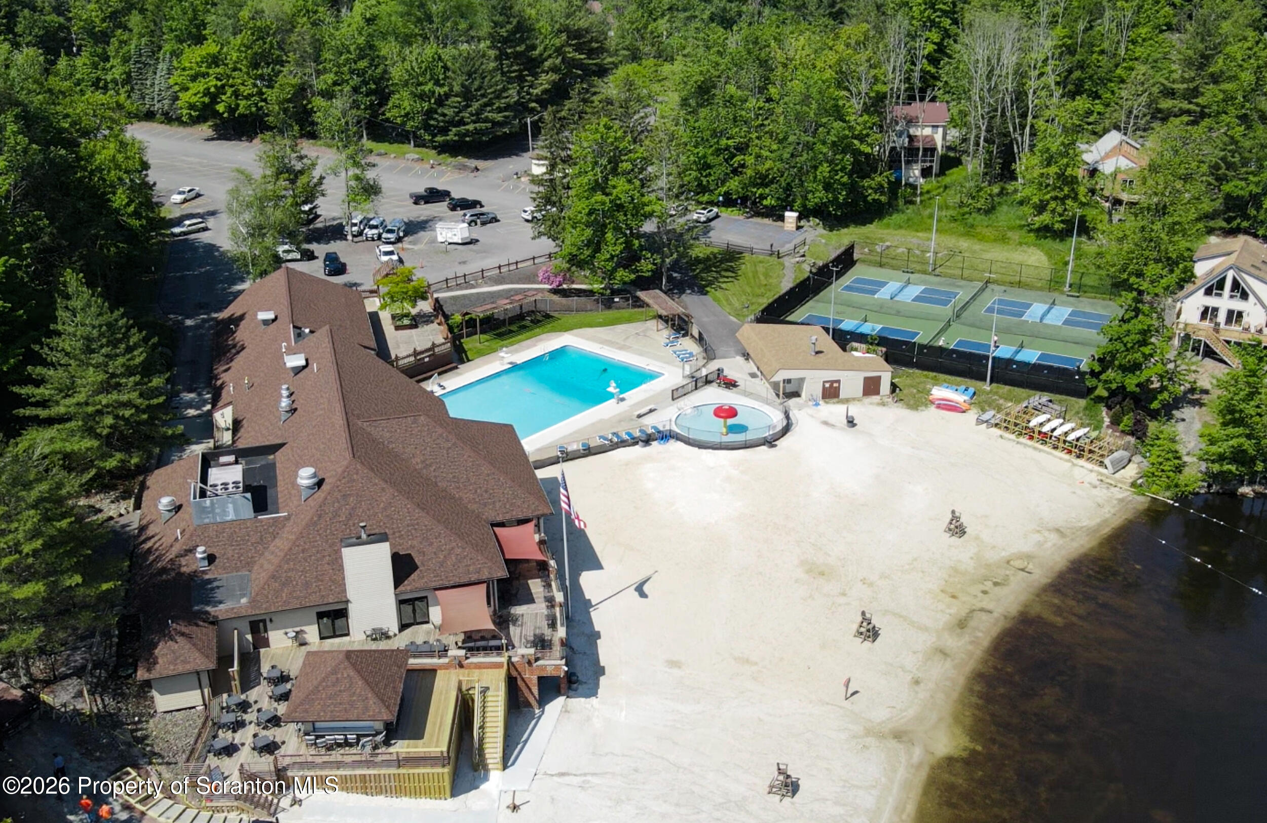 1647 Windmere Place Lake Ariel, PA 18436 - Photo 52 of 65 an aerial view of a swimming pool with outdoor seating