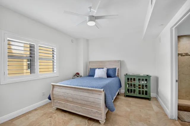 a kitchen with stainless steel appliances granite countertop a sink stove and microwave