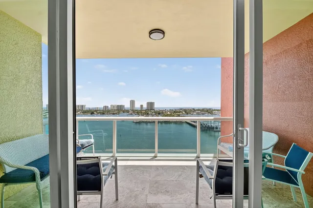 a view of a livingroom with furniture and entryway