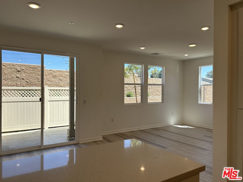 154 Tarragon Way Upland, CA 91786 - Photo 3 of 21 an empty room with windows