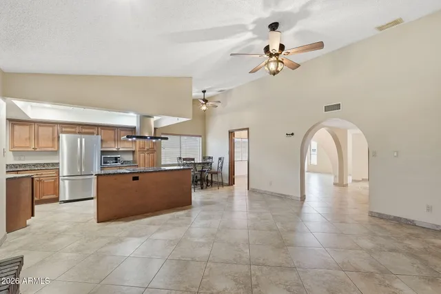 a view of a kitchen with furniture and a kitchen view