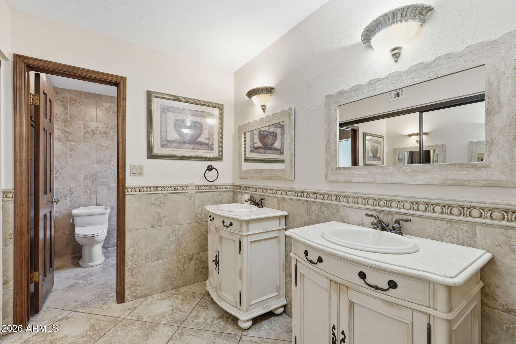 1305 North Spring Circle Mesa, AZ 85203 - Photo 16 of 28 a bathroom with a sink toilet and shower