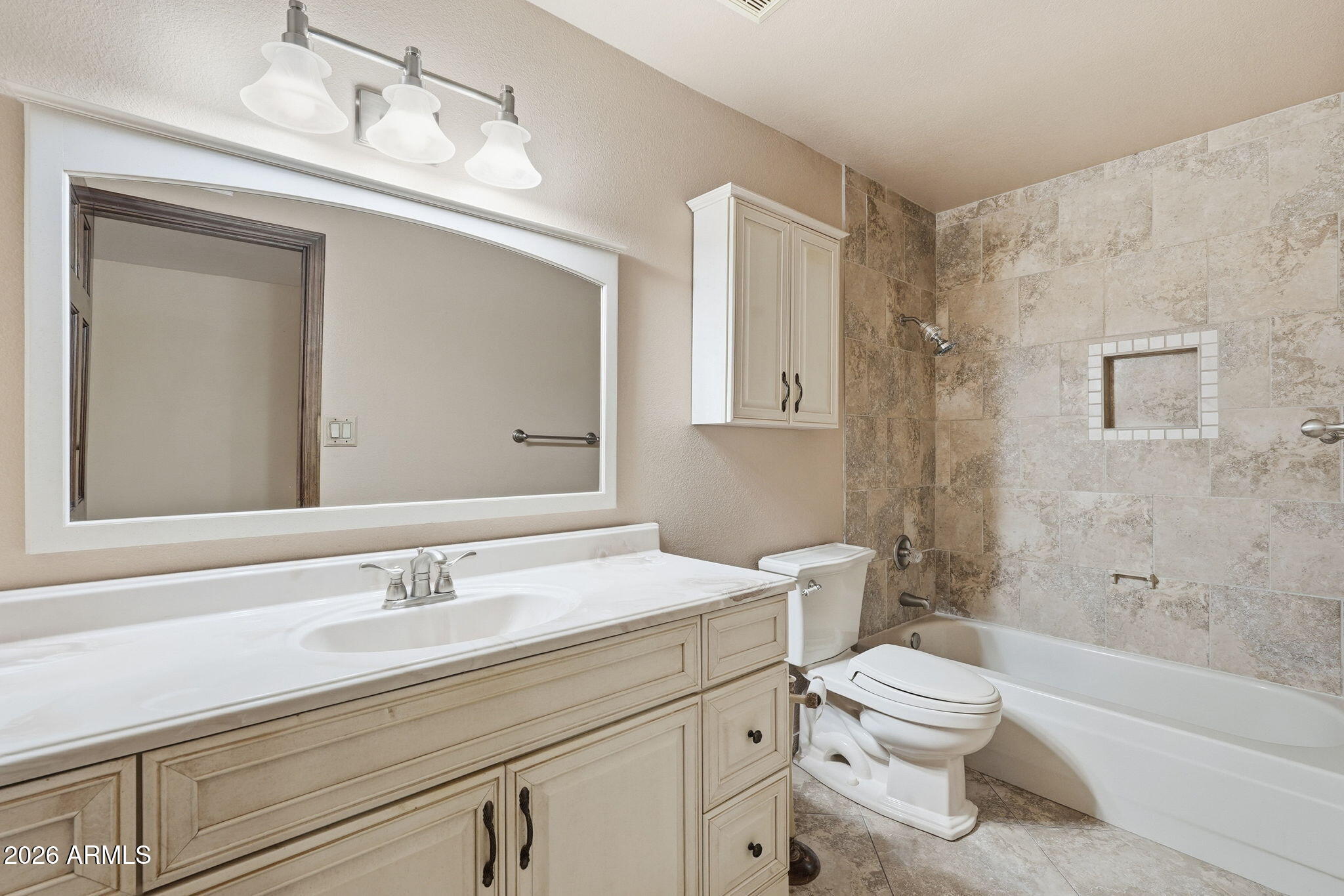 1305 North Spring Circle Mesa, AZ 85203 - Photo 22 of 28 a bathroom with a sink a toilet and shower