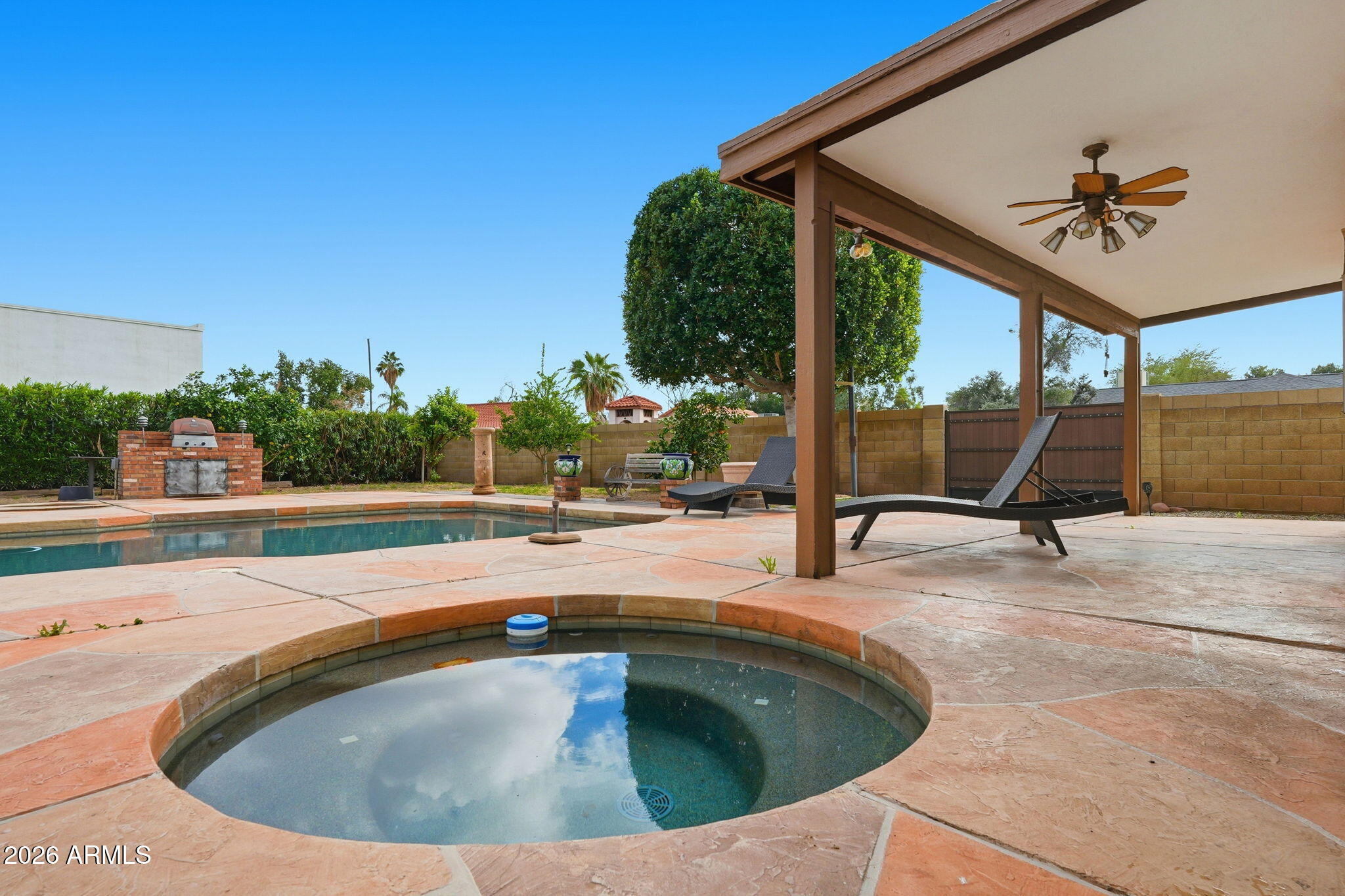 1305 North Spring Circle Mesa, AZ 85203 - Photo 23 of 28 a view of a swimming pool with a patio
