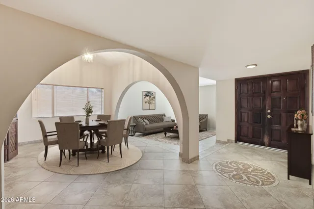 a view of a livingroom with furniture and front door