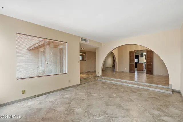 an empty room with window