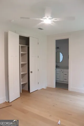 a bathroom with 2 sink and a mirror