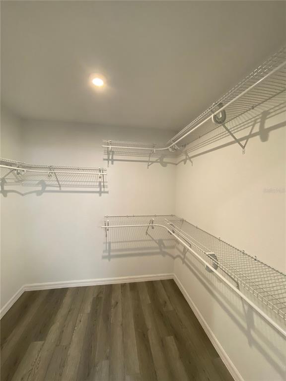 2458 Southwest 170th Loop Ocala, FL 34473 - Photo 16 of 25 a view of a room with racks on the wall