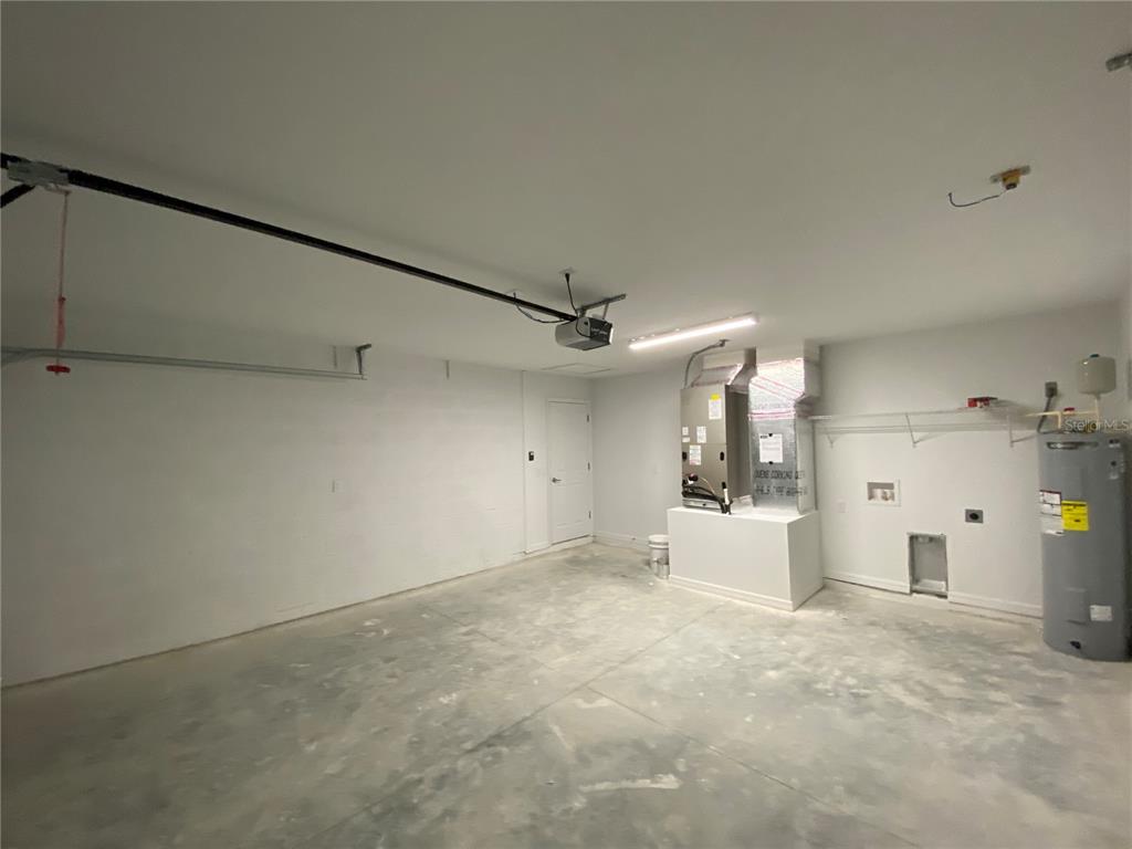 2458 Southwest 170th Loop Ocala, FL 34473 - Photo 23 of 25 a view of a big room with closet and windows