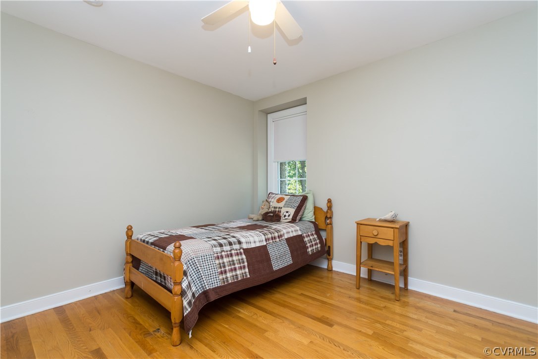 1971 Castlebridge Road Midlothian, VA 23113 - Photo 17 of 29 a bedroom with a bed and a table
