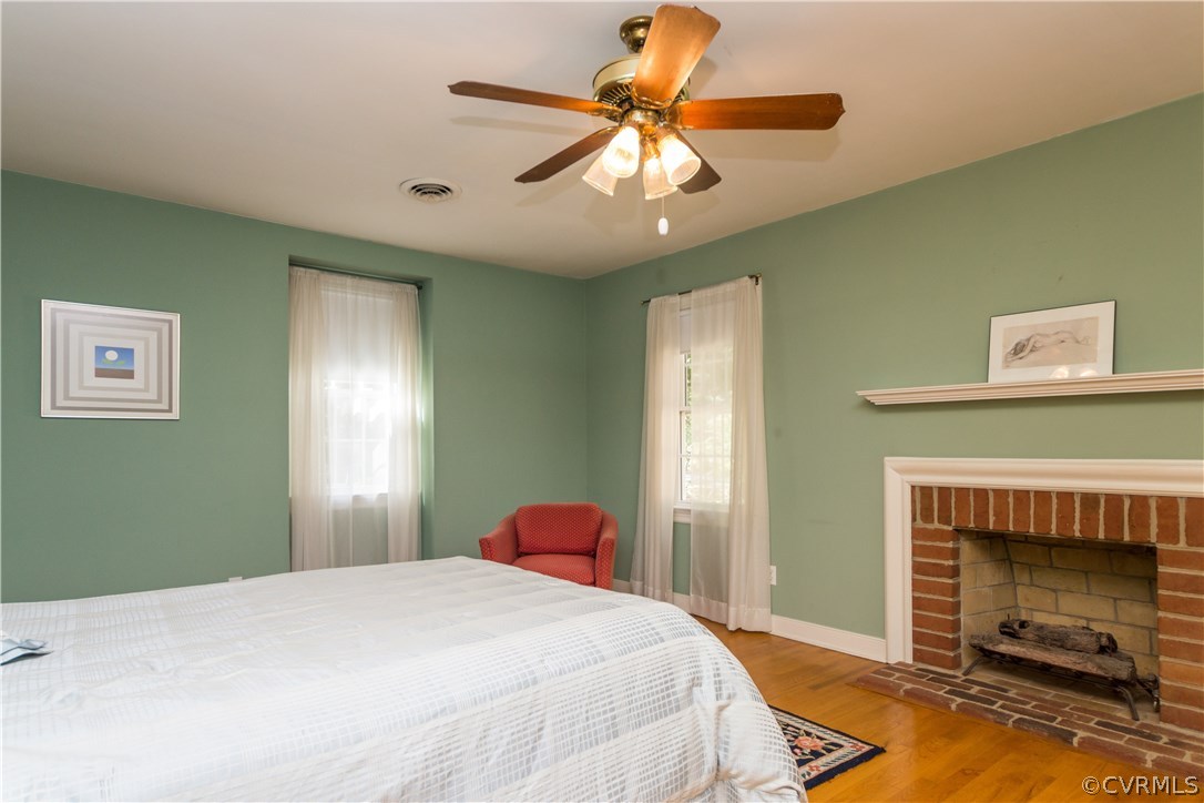1971 Castlebridge Road Midlothian, VA 23113 - Photo 23 of 29 a bedroom with a bed and a fireplace