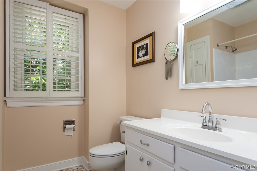 1971 Castlebridge Road Midlothian, VA 23113 - Photo 24 of 29 a bathroom with a granite countertop sink mirror vanity and toilet