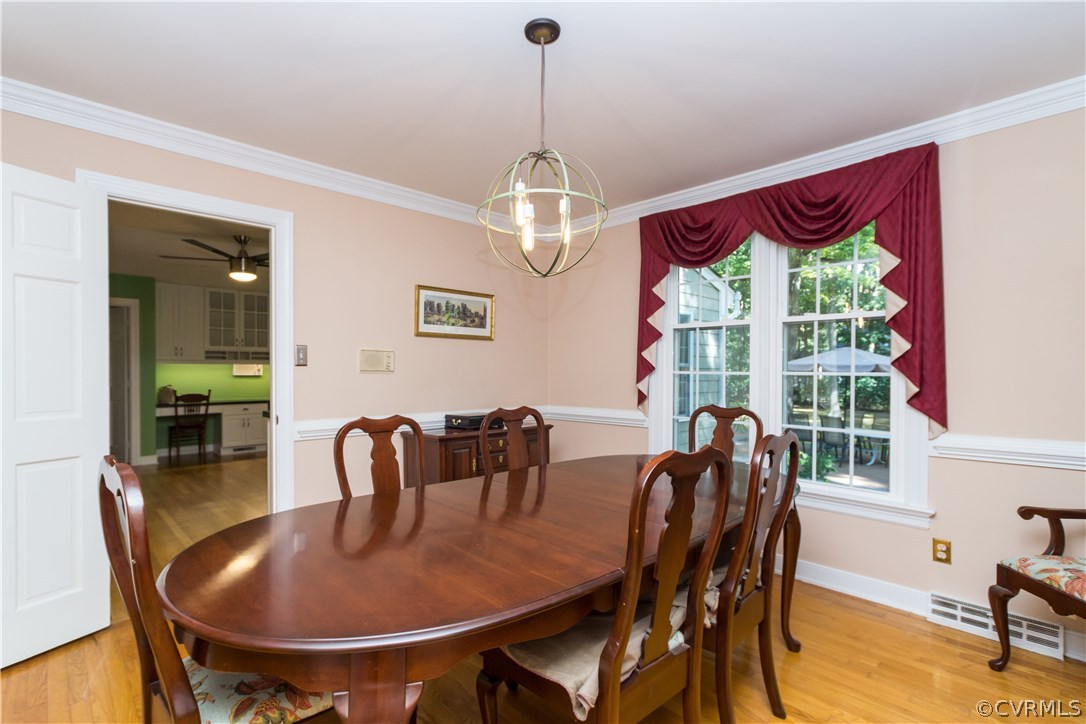 1971 Castlebridge Road Midlothian, VA 23113 - Photo 5 of 29 a dining room with furniture a chandelier and window