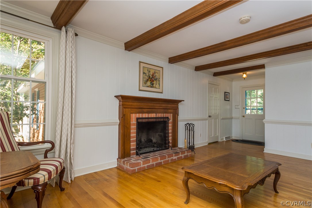 1971 Castlebridge Road Midlothian, VA 23113 - Photo 8 of 29 a living room with a fireplace and a table
