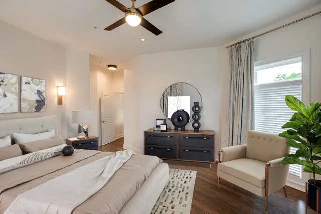 a bedroom with a bed and furniture