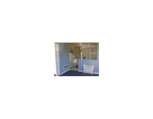 1137 Barton Street Corpus Christi, TX 78418 - Photo 2 of 5 a living room with a large window