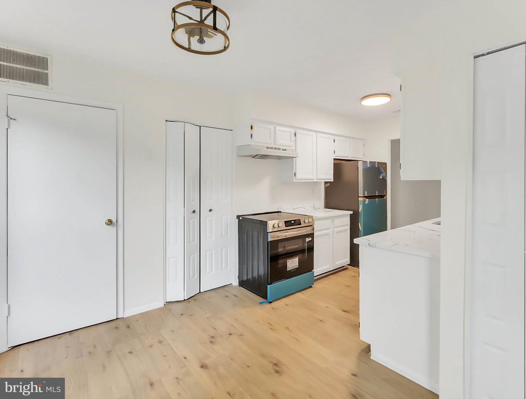 13200 Conductor Way, Unit 265 Silver Spring, MD 20904 - Photo 7 of 16 New flooring